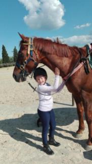 Castrone Quarter Horse Tabasco Jac Jetn con bambina